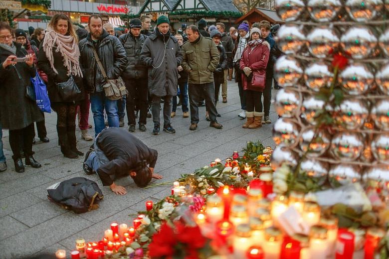 In Pictures: Tributes For Berlin's Christmas Market Attack Victims ...