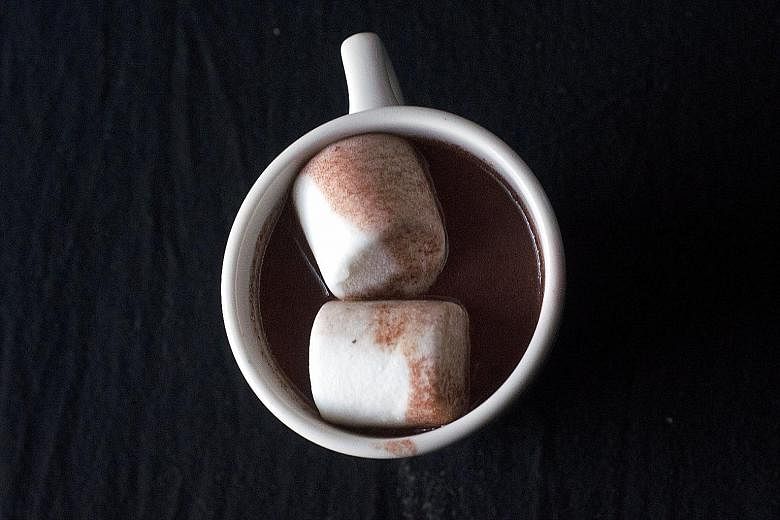 According to a small but dedicated circle of food blogs, red wine hot chocolate is the must-have drink of this winter.