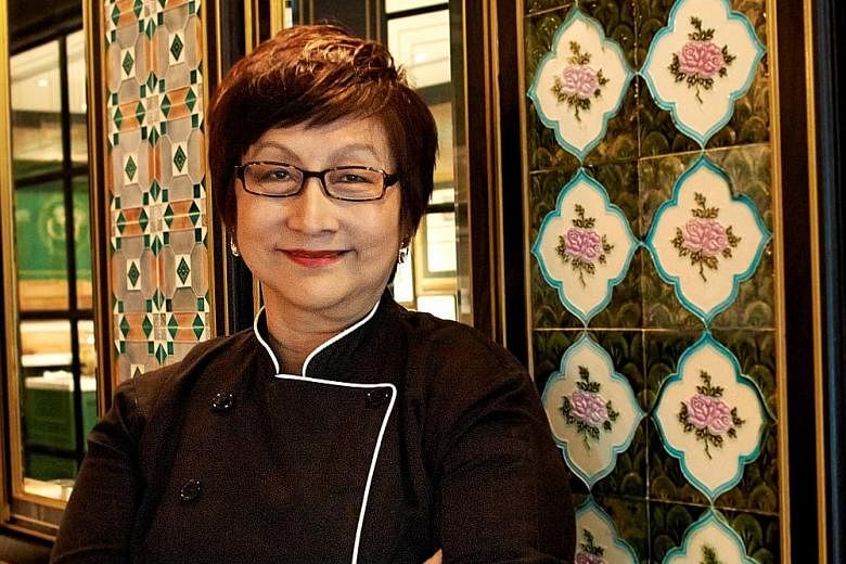 The popularity of satay at Ms Violet Oon's (right) existing restaurants resulted in the decision to open a satay bar.