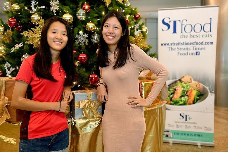 Winners Quek Pei Jun (far left), a junior college student, and Venus Teo (left), a graphic design student from Lasalle.