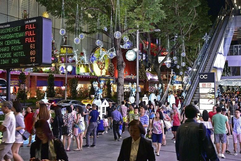 The crowds thronging Orchard Road earlier this month. While people should not be paranoid and continue with their daily activities, Singapore should err on the side of caution in guarding against the terror threat.