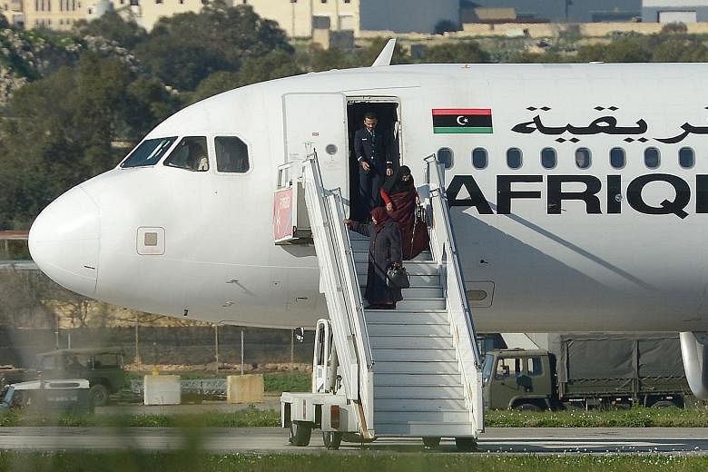 All passengers, including an infant, and crew members were released in Malta. The Afriqiyah Airways 320 jet was hijacked while en route from Sabha to the Libyan capital, Tripoli. The two hijackers, who surrendered, were apparently seeking political a