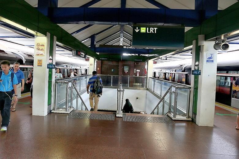 Left: The Land Transport Authority will open two new train platforms at Choa Chu Kang LRT station on Tuesday. Below: The staircase connecting Choa Chu Kang's LRT and MRT stations was also recently widened to help cope with the increase in commuters.