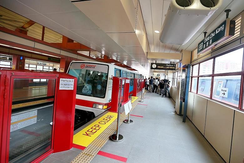 Above: The Land Transport Authority will open two new train platforms at Choa Chu Kang LRT station on Tuesday. Below: The staircase connecting Choa Chu Kang's LRT and MRT stations was also recently widened to help cope with the increase in commuters.