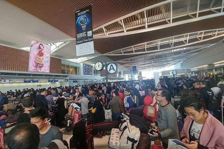 A Scoot spokesman said hotel accommodation could not be arranged for the stranded passengers because the hotels had run out of rooms. On Friday, 284 flights were cancelled and about 6,000 people had to spend the night at the airport. Mr Jerome Lim sa