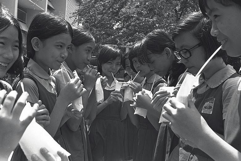 Students of River Valley Secondary School drinking milk in 1974, part of a subsidised scheme by the Education Ministry for about 27,000 students.