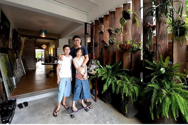 Mr Calvin Soh with his son Dylan and daughter Ava. Mr Soh thinks the Pisa rankings are evolving too slowly and cannot catch up with the exponential pace at which technology is developing. He has set up One Kind House, a community space with an urban 