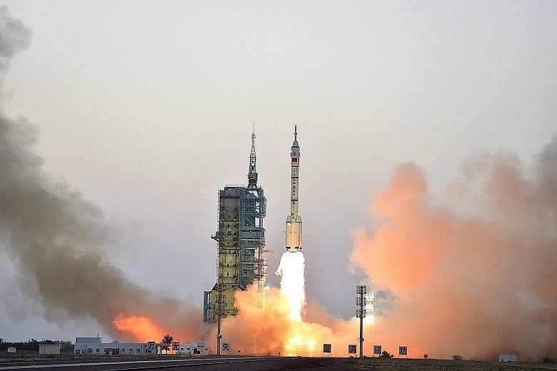 Shenzhou-11 taking off in October, carrying two astronauts who spent 30 days on board the Tiangong 2 space laboratory, which China is using to carry out experiments ahead of a plan to have a permanent manned space station.