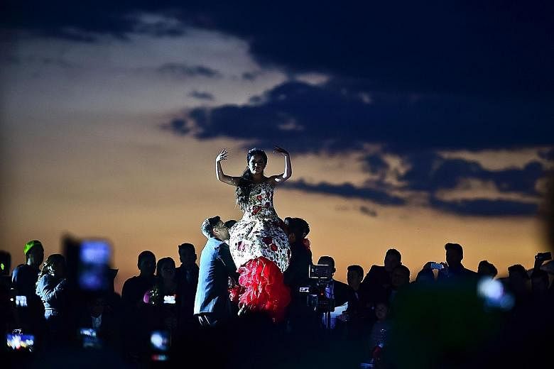 Rubi Ibarra getting a major birthday lift at her party which drew 10,000 people - but not the 1.3 million who said they would show up. The small-town Mexican girl turned 15 in flamboyant style after her parents' video invitation to the milestone even