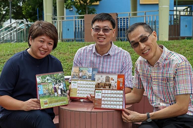Left: A family pose with a mural in Tiong Bahru painted by Mr Yip in a photo used for the church's calendar. Below left: (From left) Mrs Tan, the church's media executive, and pastors Kelvin Poh and Mr Wong showing off the calendars, which were distr