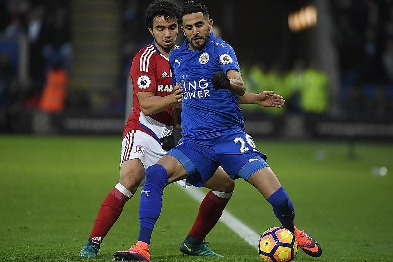 Leicester's Riyad Mahrez shielding the ball from Middlesbrough's Fabio Da Silva during a Premier League game last month. The Algerian has not yet adjusted fully to the new system of play, as the team struggle to stay clear of the relegation zone.
