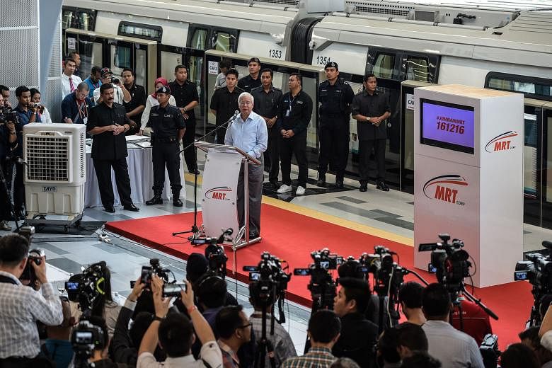 Mr Najib launching Malaysia's MRT on Dec 15. The lack of public trust stands in the way of Malaysia's long-term goals. 