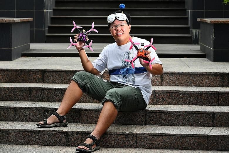 Dr Yeoh with first-person view goggles strapped on. They can be connected wirelessly to a camera mounted on his drone during its flight, which can make him feel like Superman.