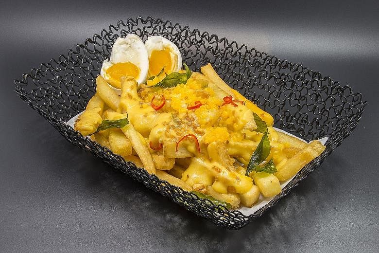 Salted egg yolks are high in cholesterol and sodium, but dishes such as salted egg cheese fries (left) are popular.