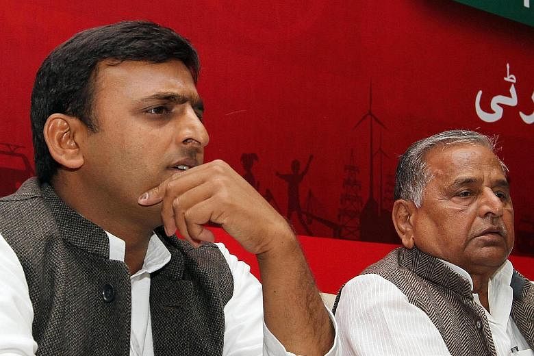 Uttar Pradesh Chief Minister Akhilesh Yadav (left) has been chosen as Samajwadi party chief on Sunday over his father Mulayam (right). But the latter called the appointments that day "illegal".