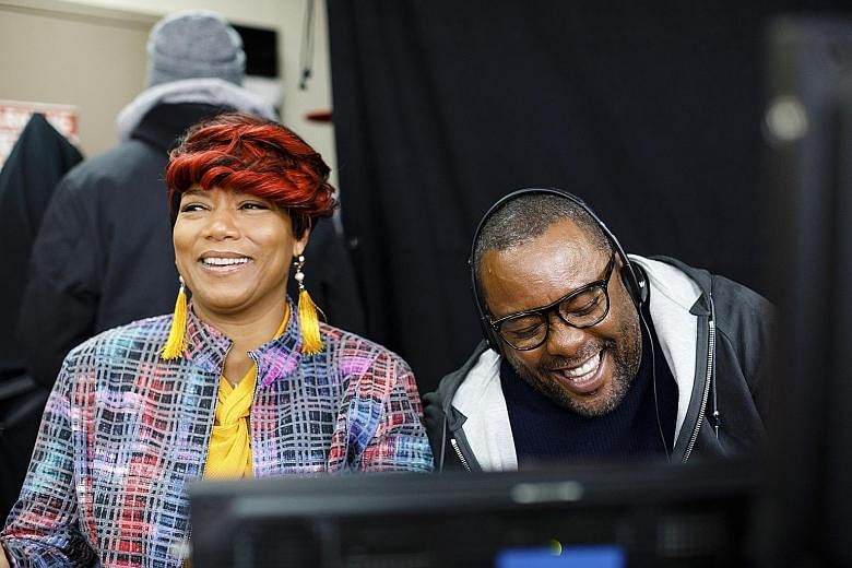 Lee Daniels with Queen Latifah on the set of Star.
