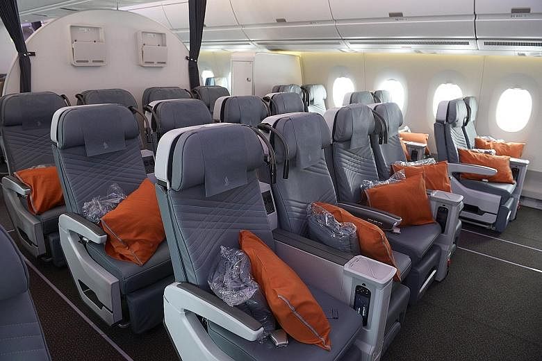 SIA's premium economy cabins boast features such as wider seats with greater recline and more legroom, as well as perks that include better food.