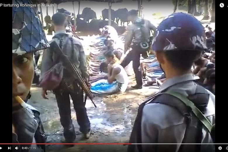 Police officers are seen hitting villagers seated in rows on the ground, hands behind their heads. This is the first time the government has pledged to take action over the abuse of Rohingya by security forces.