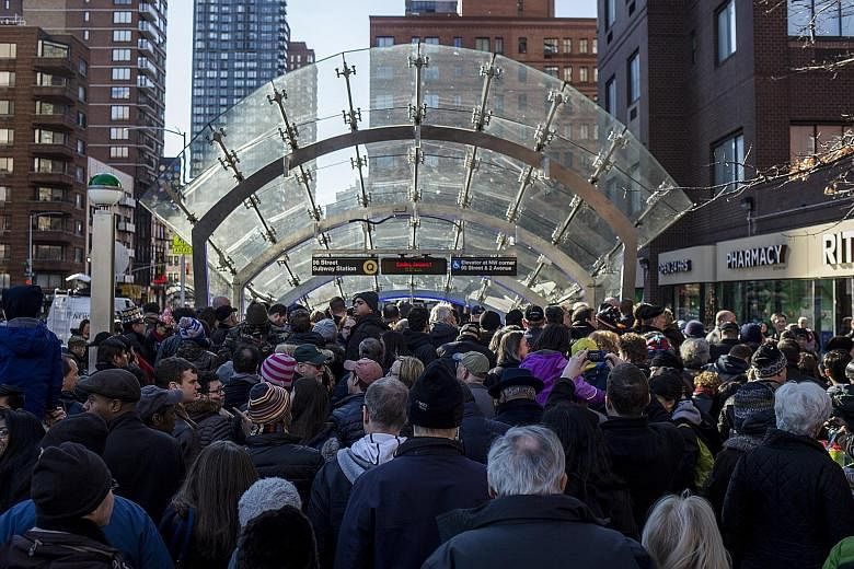 New Yorkers arrived at the three stations on the line with huge grins and wide eyes, taking in the bells and whistles. Thousands of riders streamed into the three stations of the Second Avenue subway on Sunday to witness a piece of history nearly a c