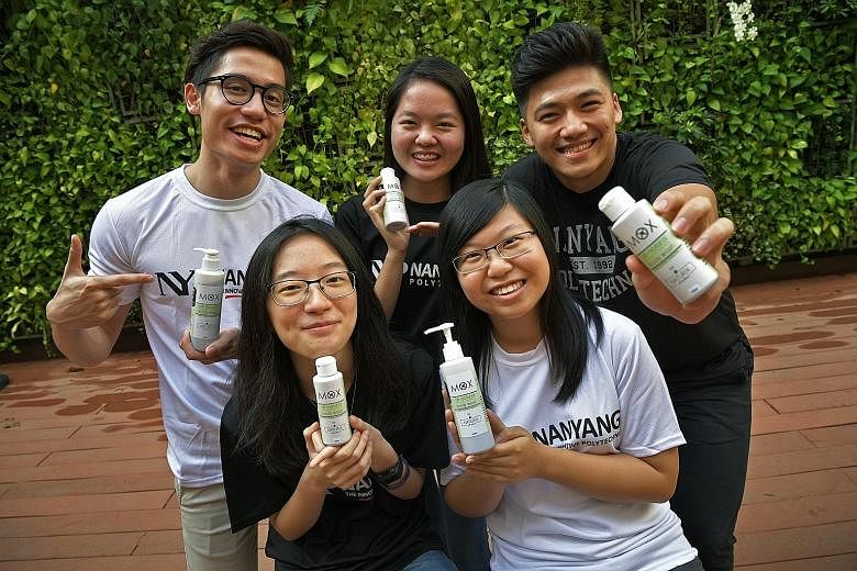 NYP students (clockwise from far left) Brian Lee, Rebecca Chua, Iann Hussi, Lam Ching Man and Teo Seok Yee with the MOX Body Wash they developed, which can be used to repel insects for up to eight hours.