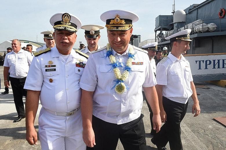 Philippine Navy Commodore Francisco Gabudao Jr with Russia's Rear-Adm Mikhailov, after two ships arrived on a "goodwill visit".