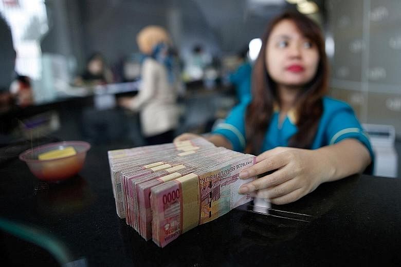 The rupiah's vulnerability has been reduced, thanks to a narrower current-account deficit, lower gross external indebtedness and higher foreign-exchange reserves, says Mr Andrew Tilton, Goldman Sachs' chief Asia-Pacific economist. He also says that S