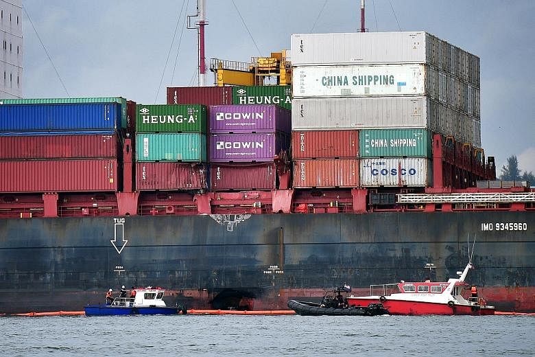 The cause of the collision between the Gibraltar-registered container vessel APL Denver (above) and a Singapore-registered container vessel on Tuesday night is under investigation.