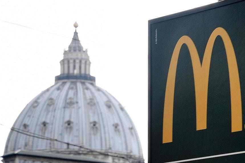 The McDonald's outlet in the Roman district of Borgo is just a stone's throw from St Peter's Square. Cardinal Elio Sgreccia says the space occupied by the restaurant should have been used to help the needy.