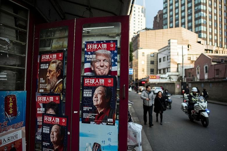 Mr Trump on the cover of a Chinese magazine advertised in Shanghai. Concern that the US President-elect will make good on his threats to take punitive measures on China's exports has added to rising pressure on the yuan.