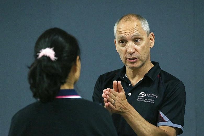 Australian swim coach Stephan Widmer speaking to local coaches after a coaching clinic at the Sports Hub. He is in Singapore for a week to conduct a series of clinics.