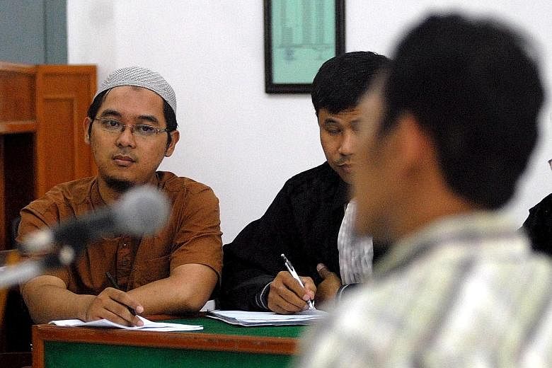 Bahrun, an Indonesian ISIS fighter, at his trial in Solo, Central Java, in 2011. He is believed to have directed funds to domestic terror cells across Java via online payment services such as PayPal and bitcoin.