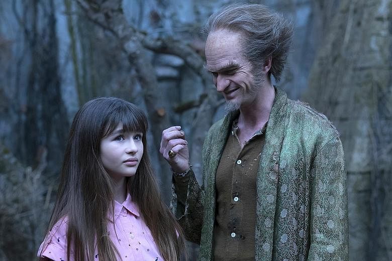 Neil Patrick Harris, who plays the devious Count Olaf, with Malina Weissman, one of the orphans in A Series Of Unfortunate Events.