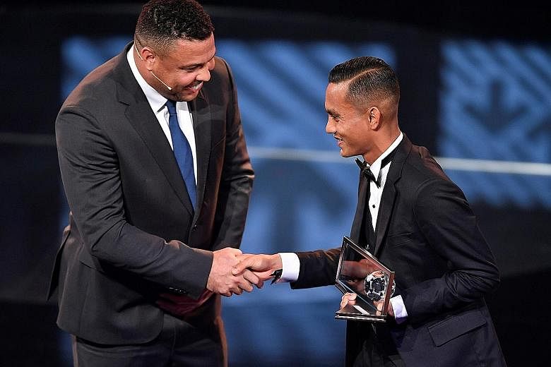 Penang FA forward Faiz Subri received the Fifa Puskas Award from Brazilian great Ronaldo at the award ceremony on Monday. His stunning free kick secured 59.46 per cent of a global vote.