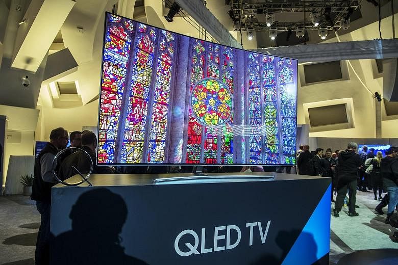 Samsung's Qled versions are basically conventional LCD-based TV sets enhanced by quantum dots.