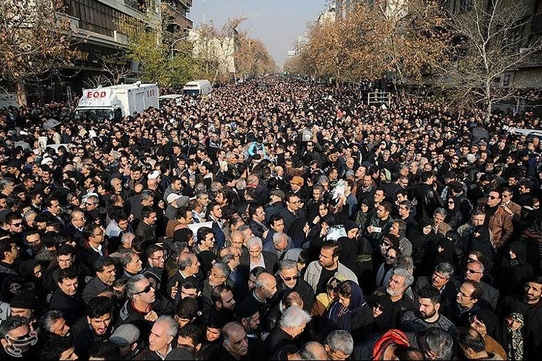 Mourners gathering during the funeral of former president Akbar Hashemi Rafsanjani in Teheran yesterday. It took more than two hours for the cortege to get to the mausoleum where Mr Rafsanjani was laid to rest.