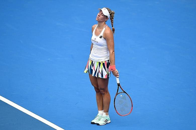 Top-ranked Angelique Kerber reacts after missing a shot against Russian Daria Kasatkina during their second match at the Sydney International tennis tournament. The German committed 41 unforced errors in the 7-6 (7-5), 6-2 loss.