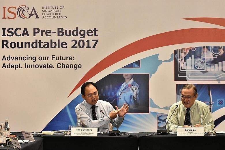 The pre-Budget roundtable was co-chaired by Mr Liang (left) and Mr Ee. The 15 members in the discussion said long-term economic transformation is key but businesses also need short-term help to tide over the current period of slow growth.