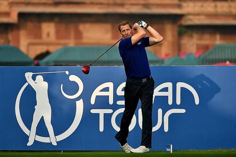 Josh Burack teeing off before the Panasonic Open India at the Delhi Golf Club in New Delhi last month. Appointed Asian Tour CEO last October, he does not see the US PGA Tour as a threat to the region as it already has a very packed schedule.