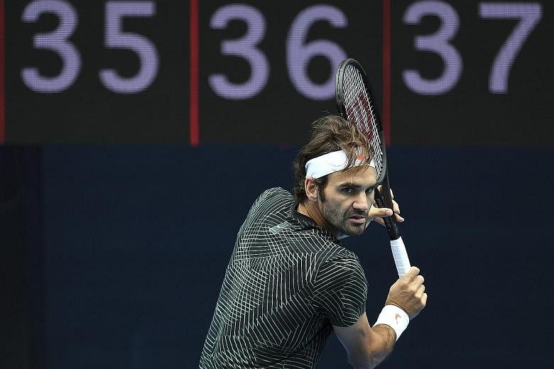 Swiss tennis legend and 17-time Grand Slam champion Roger Federer practising for the Australian Open on Rod Laver Arena in Melbourne on Monday. Most higher-ranked players will be hoping to avoid an early clash with him or fellow former world No. 1 Ra