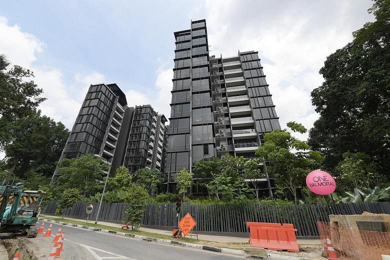 The Peak@Cairnhill II (above) was launched on Monday with a 15 per cent discount and an enhanced deferred payment scheme, while the developer of One Balmoral (below) is offering a 13 per cent discount on the prices of all units.