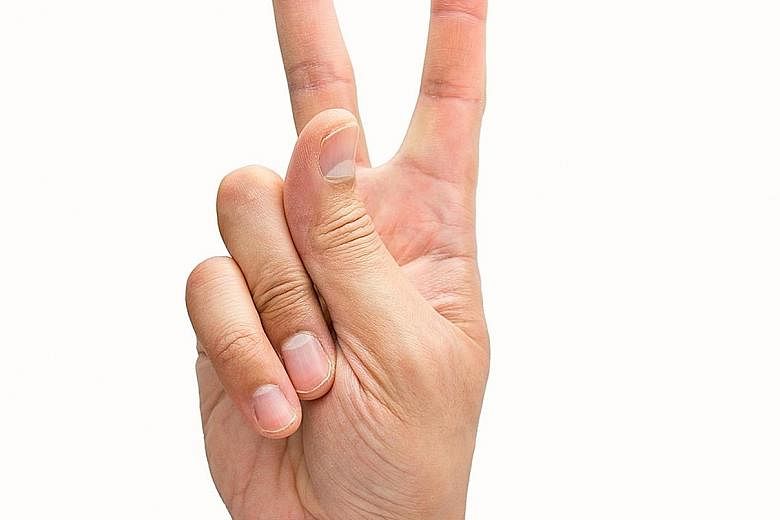 Researchers are able to copy fingerprints from photos taken by a digital camera, raising alarm bells over the two-fingered gesture.
