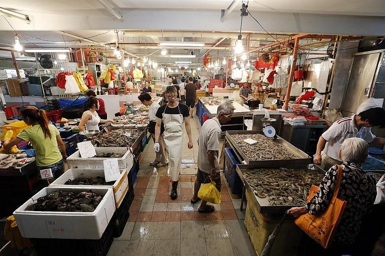 A check at several wet markets, such as this market in Chinatown, showed that prices of fish, such as pomfret and red grouper, have increased by 30 to 50 per cent compared with about three weeks ago. Large prawns also now cost $35 per kg, up from $28