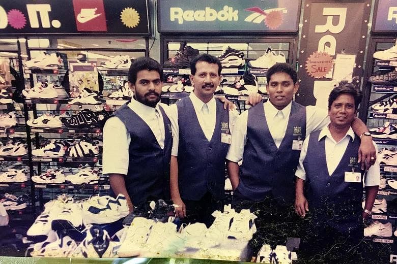 Mustafa retail supervisor P. Mohamed Rafeek (left) with his colleagues from the sportswear section at the Serangoon Plaza store in 1996. Beside him is Mr Abdul Rahman, 47, now a supervisor at the supermarket section in Mustafa Centre. The other two m