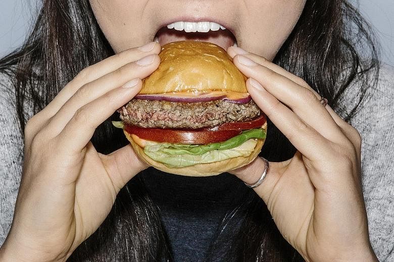 Impossible Foods wants to win meat-lovers over with its veggie Impossible Burger.