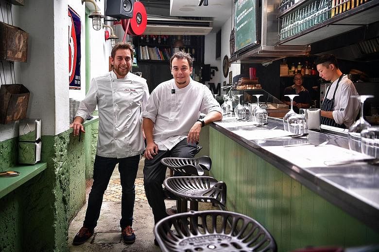 Chef Nacho Baucells (left) of the acclaimed El Celler de Can Roca will be collaborating with Esquina's chef Carlos Montobbio (right) for a two-night- only dinner at Esquina.