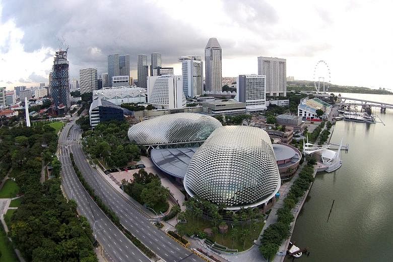 Local firm DP Architects, which was part of the design team for the Esplanade (above) and Singapore Flyer, has tied up with British firm Grimshaw Architects, and is believed to be one of the front runners for the coveted job. An artist's impression o