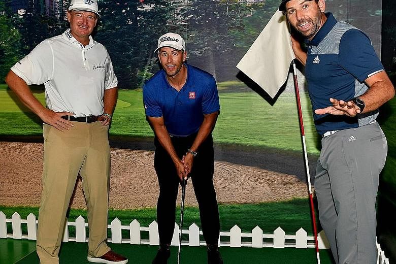 From left: Ernie Els, Adam Scott and Sergio Garcia with their version of the mannequin challenge at the Madame Tussauds Singapore wax museum yesterday. The South African, ranked No. 380 in the world, said: "I still feel if I can keep the whole thing 