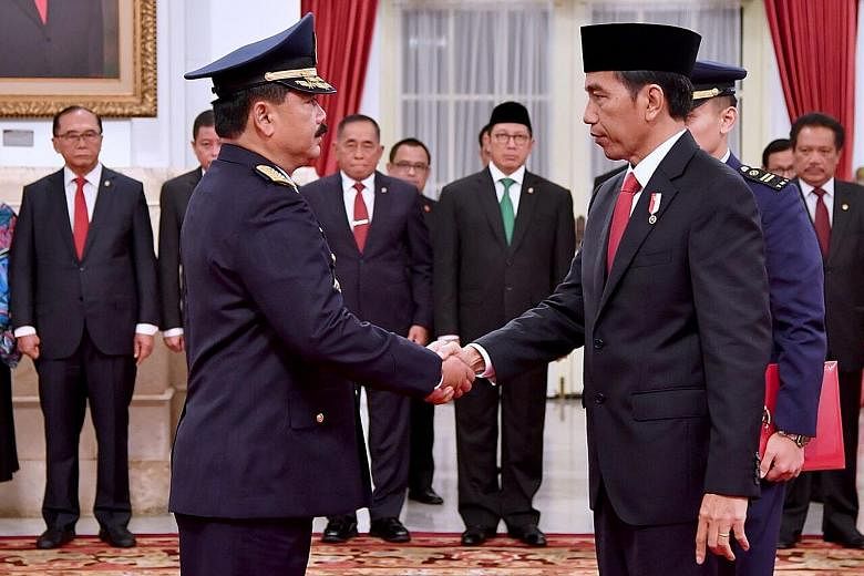 Air Marshal Hadi (left) and President Joko are said to have developed a close friendship when they were both based in Solo.