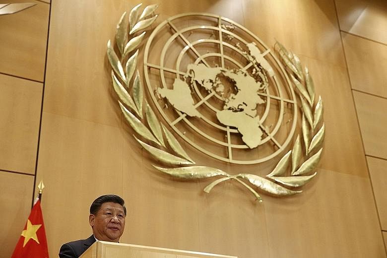 Mr Xi delivering a speech at the UN European headquarters in Geneva, Switzerland, on Wednesday. Nations should advance democracy in international relations and reject dominance by just one or several countries, he said.