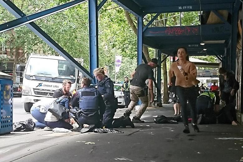 Gargasoulas had allegedly stabbed his brother early yesterday morning before the driving rampage. Police officers and emergency services staff attending to the injured after the car driven by Gargasoulas hit pedestrians in the heart of the shopping d